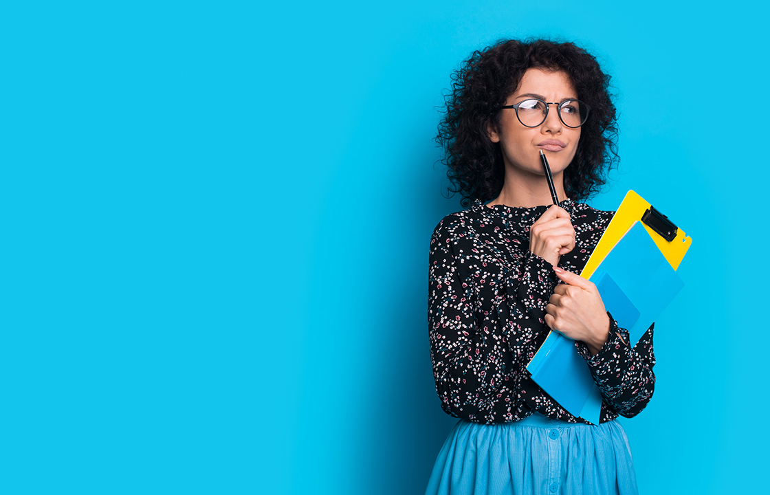 Young woman with clipboard